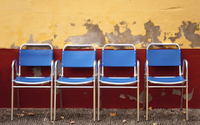 Four blue chairs