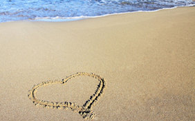 Love heart beach sand valentines day