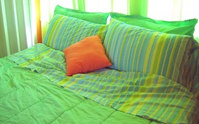 Green bed bedroom